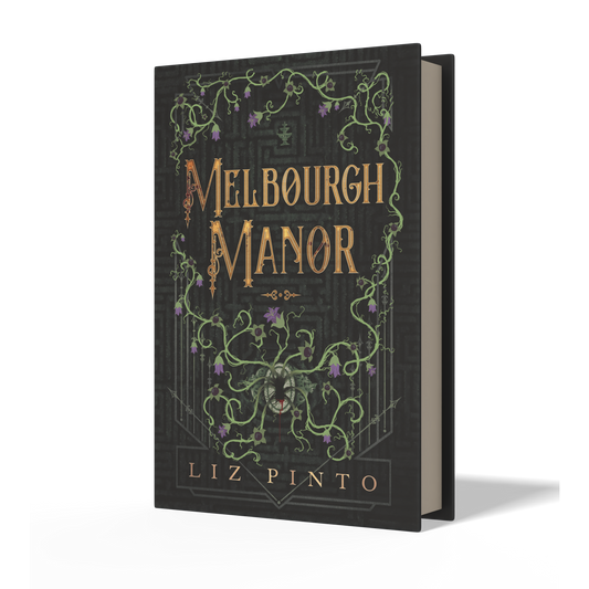 A hardcover book titled 'Melbourne Manor' by Liz Pinto, featuring a dark charcoal cover with ornate gold and green vine illustrations and gold lettering, shown standing upright on a white background with a soft shadow.